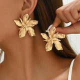 gouden bloem oorbellen groot