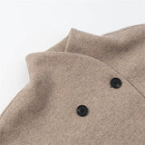 close up beige oversized double breasted damesjas