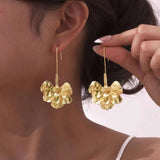 Gouden bloemoorbellen 14K plating