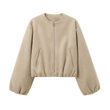 Beige bomber jas met elastische zoom en ritssluiting