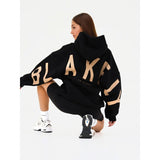 Blayen oversized sweatshirt dames zwart met beige backprint – Salejano