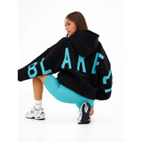 Blayen oversized sweatshirt dames zwart met turquoise backprint – Salejano