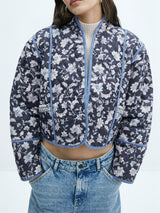 Fleur Quilted Jacket – reversible gewatteerde tussenjas met vintage bloemenprint en cropped fit