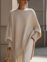 Beige oversized trui met vleermuismouwen en brede ribboorden aan de mouwen
