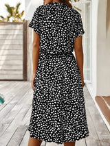 Zanelya | Midi Zomerjurk met Abstracte Stippenprint & Knoopsluiting