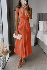 Oranje elegante cut-out jurk met plissé rok 
