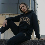 Zwarte lounge set met panteraccenten dames