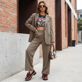 chunky loafers met strik gecombineerd met blazer en jeans