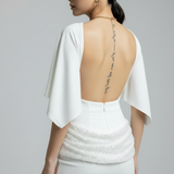 witte jurk met open rug en wijde mouwen en glinster detail dames