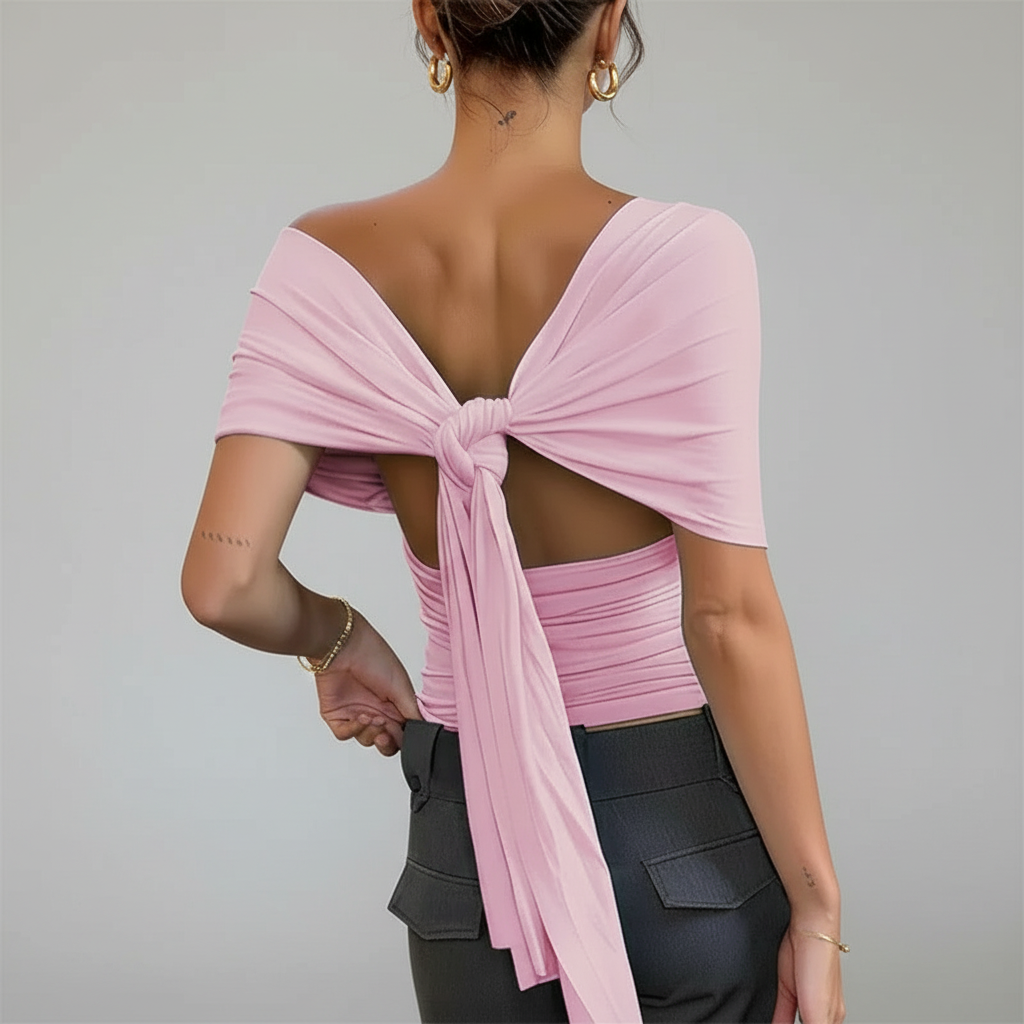 lichtroze top met strikdetail op de rug en open achterkant dames