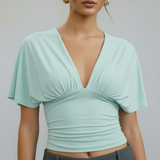 mintgroene top met V-hals en korte mouwen dames