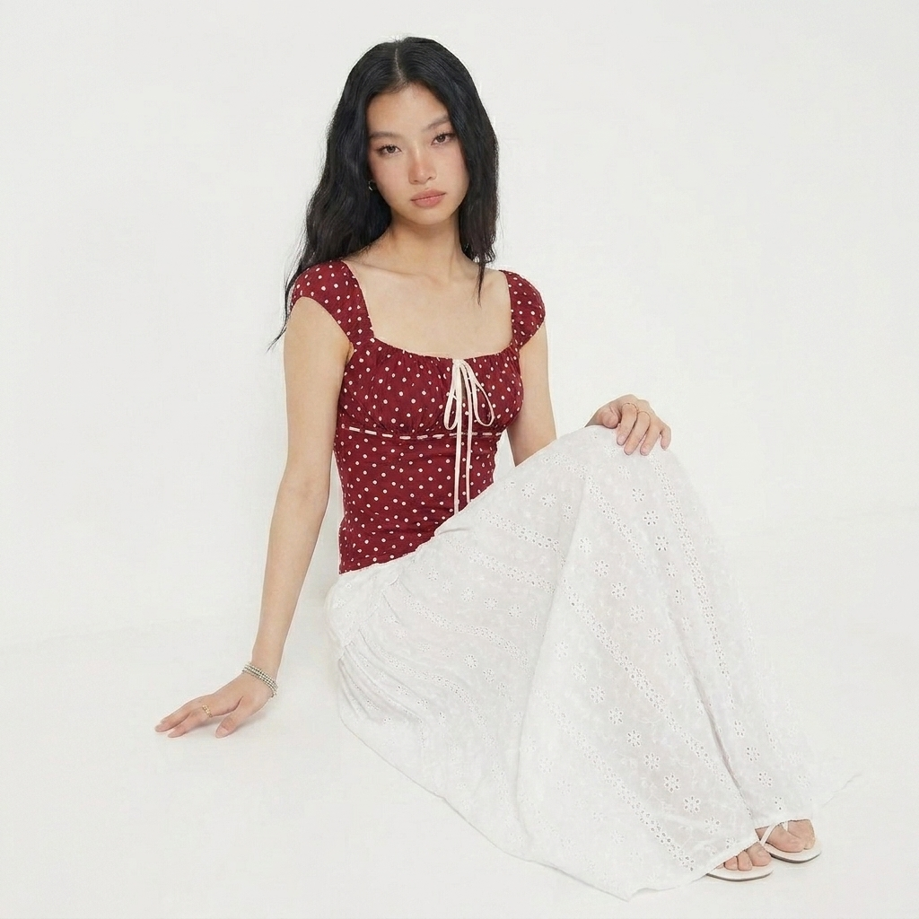 Liora Top | Polka-Dot-Top mit Schleifendetail und romantischer Passform