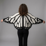 achterkant zwart wit vlinder vest met groot vleugelpatroon dames