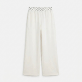 Witte wijde joggingbroek met polkadot tailleband voor dames