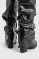 Marzella Slouch Boots detail – close-up plooidesign en hakafwerking, slouch boots trend