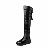 winter overknee boots met shiny neus trendy 2025