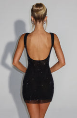 zwarte glitter mini jurk met diepe open rug en brede bandjes – achterkant