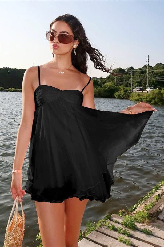 zwarte mini jurk met ruffle zoom bij het water dames